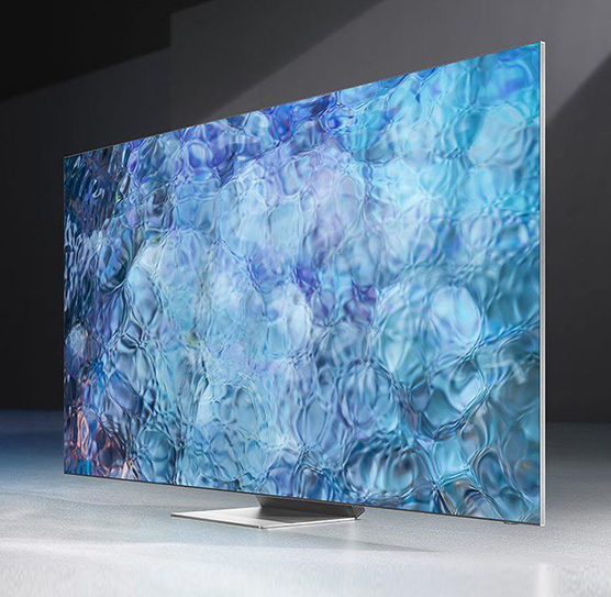 téléviseur avec un fond d'écran de vagues bleues